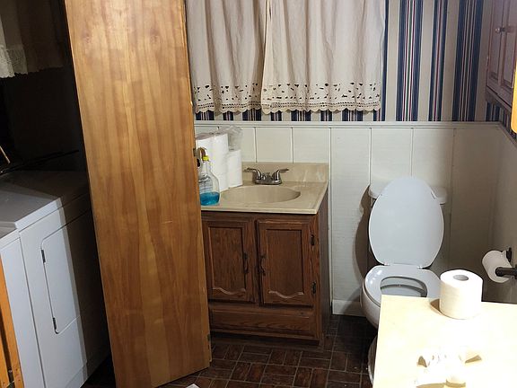 Half bath with washer dryer