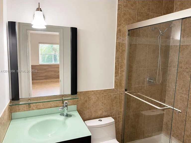 21011 NE 25th Ct — Photo 9