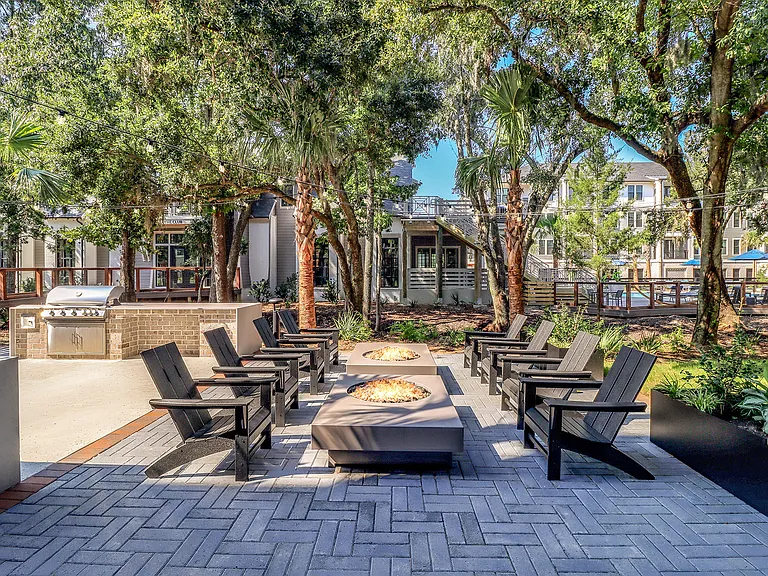 Outdoor entertaining area with gas grills and fire pits