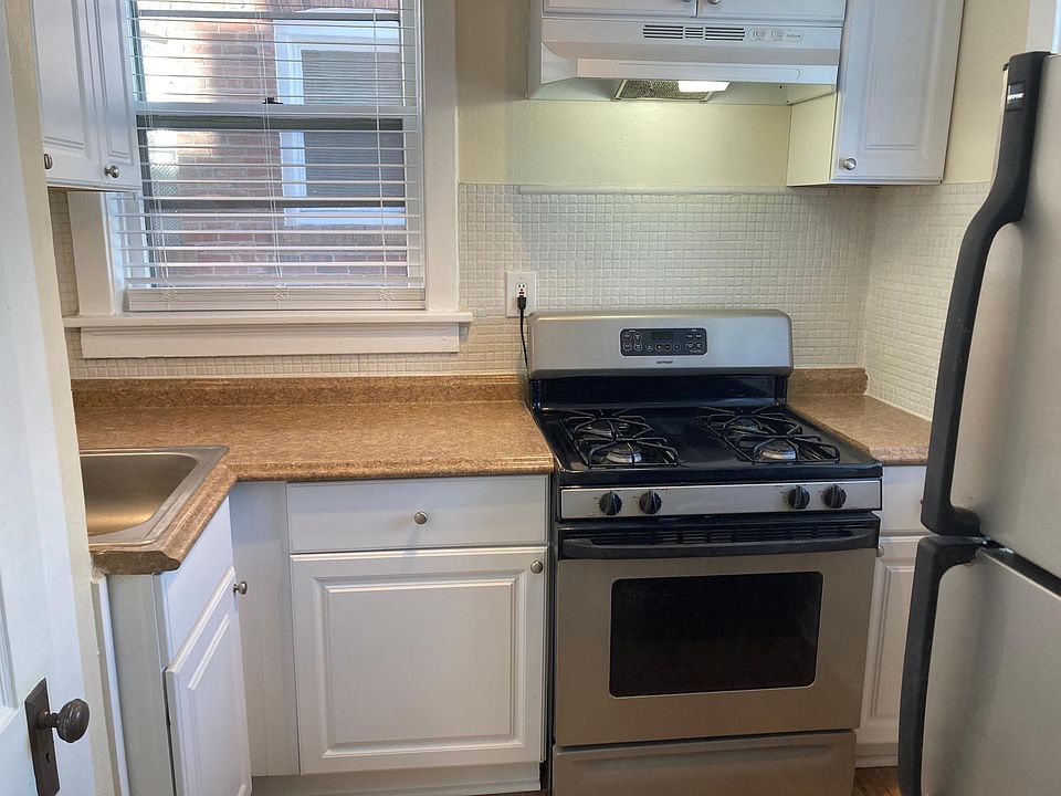 Updated kitchen with stainless steel appliances.