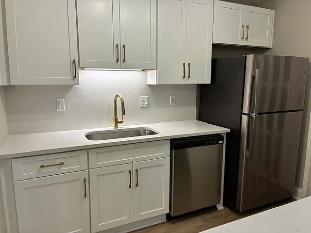 New kitchen with countertops and stainless-steel appliances