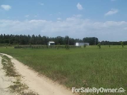Shop,Home,and arena from driveway.