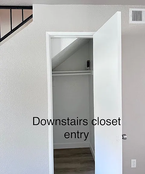 "Convenient downstairs storage closet."
