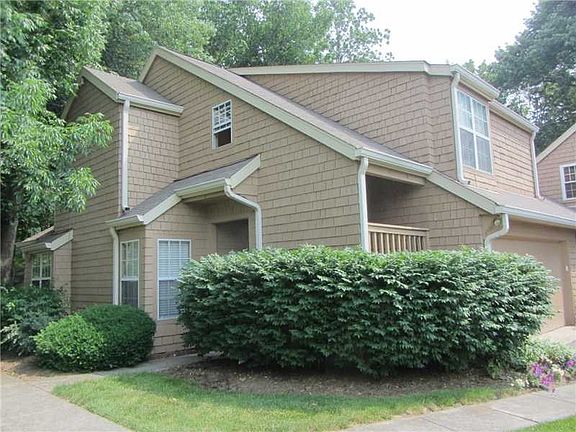 Exterior Front. Upstairs "End Unit" Condo - Private Stairway Entrance on the left
