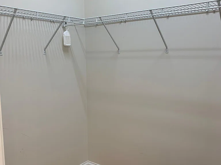 Walk-In Closet Connected to Primary Bath