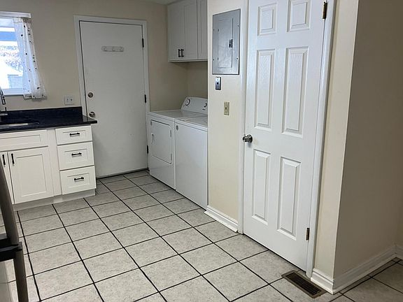laundry in kitchen, pantry.