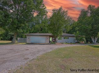 721 Seventeen Mile Rd, Kent City, MI 49330