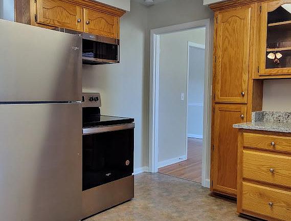 The kitchen has all new stainless steel appliances.