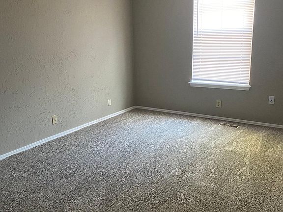 Flexible floor plan, this can be master bedroom w/ bath, there are two more bedrooms upstairs and one is quite roomy and upstairs could accommodate master suite and office, small bedroom. All neutral new paint, new carpet.