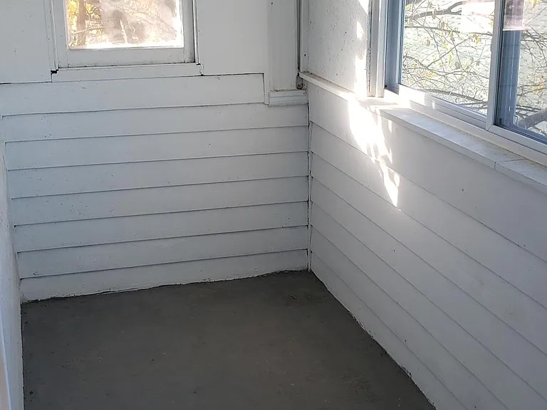 Sun porch adjoining kitchen.