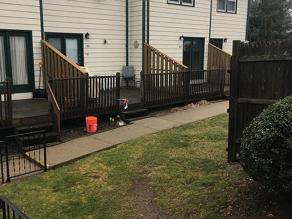 Back entrance, last unit, wooden deck not visible