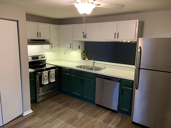Gorgeous, updated kitchen with custom tile backsplash and stainless appliances