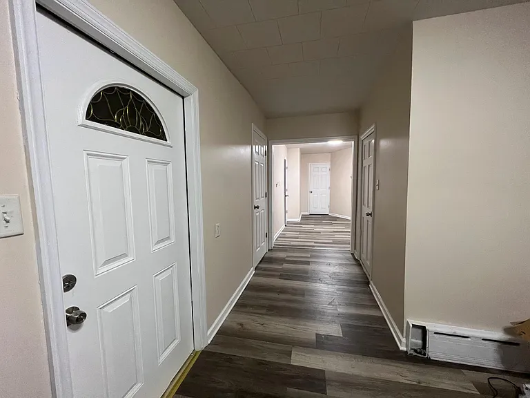 (Kitchen 4/4) Wide view and hallway into the living room.