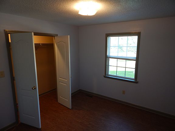 Bedroom at the front of the apartment. This bedroom is off the living room. The closet is not a "walk in" but it goes the full length of the room, so there is a lot of space.
