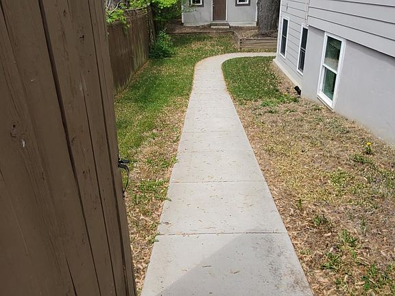 Backyard path to lower level unit