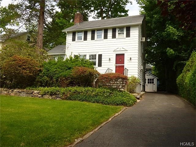 This charming Colonial has wonderful curb appeal!