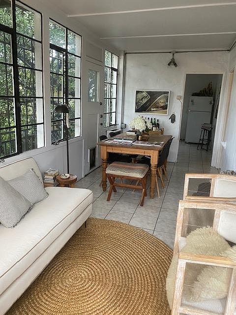 Same Sun Room
Going towards
White Tiles on the Floor