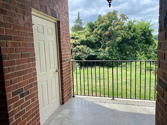 Door to storage area off of patio - a large space for extra things!
