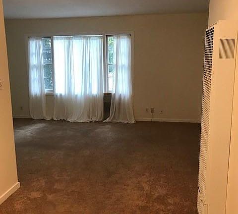 Dining area leading to living room.
