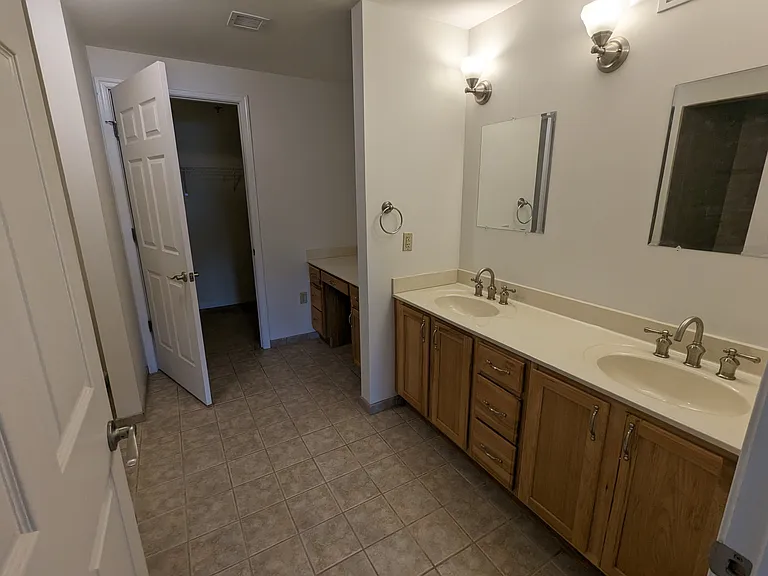 Master bath with double sink and separate vanity