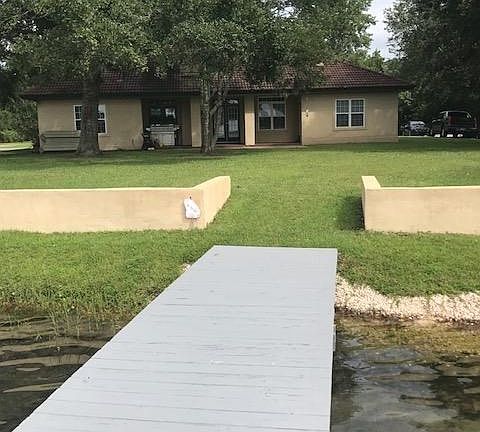 back view of home with sea wall