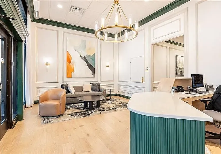 Lobby and elevators. Building provides doorman service, security camera service, and a secure package room.