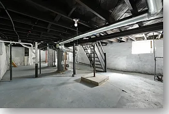 Basement entry off kitchen allows for storage with new washer and dryer.