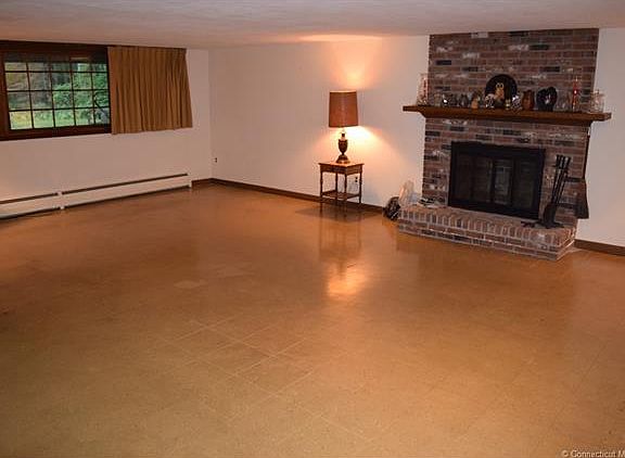 LIVING ROOM WITH USABLE WOO...