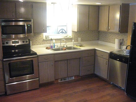 retro styled kitchen with stainless appliances