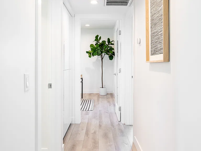 Hallway leading to bedrooms and bathrooms