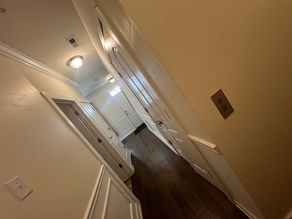 1st fl hallway to laundry, garage and elevaltor