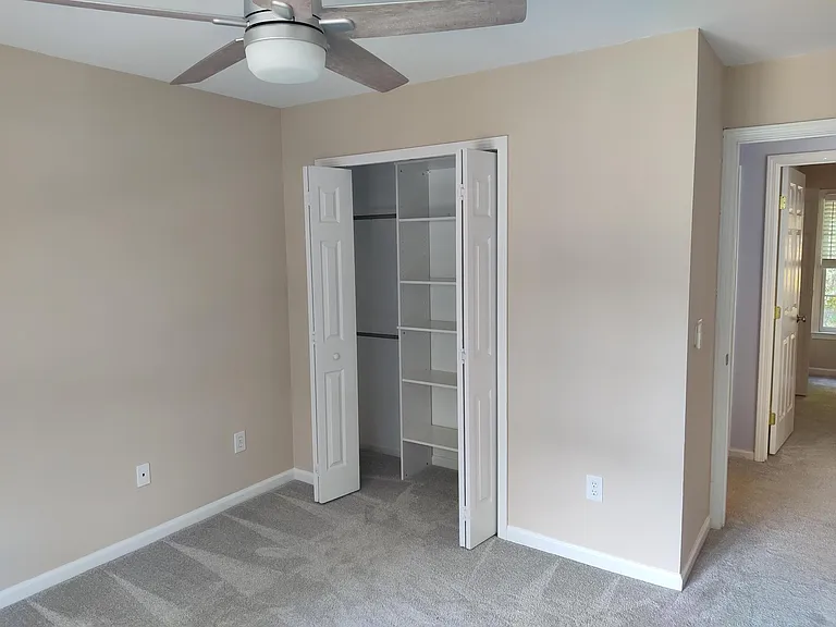 3rd bedroom has an organized closet