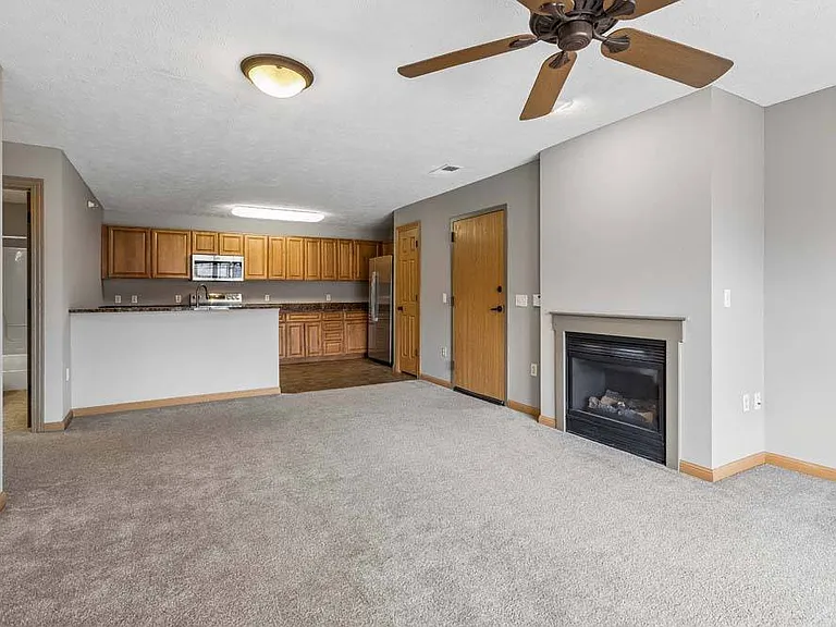 Enjoy the comfort of open-concept living in this inviting space, where cozy details and seamless flow make entertaining effortless.