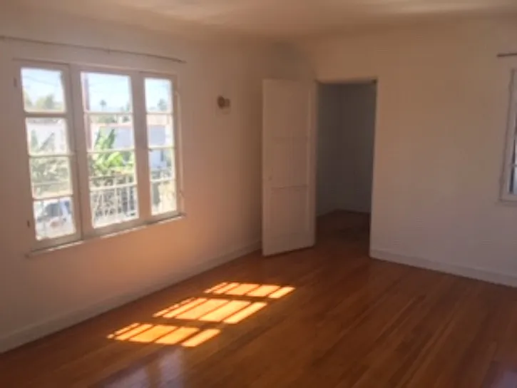 2nd floor master bedroom with a window facing west, and entry to a storage area or study nook