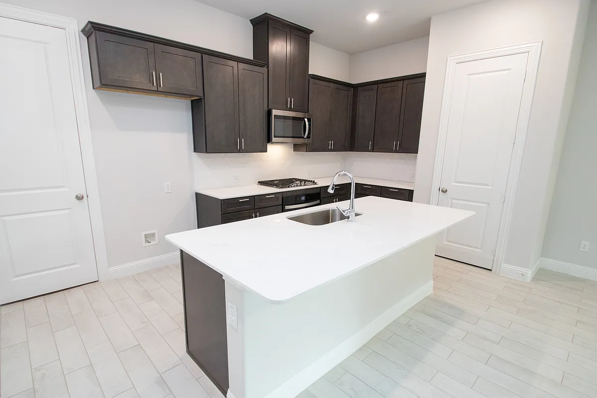 Luxury kitchen with quartz countertops, gas stove and stainless appliances (not pictured, stainless refrigerator) - 4124 Wetstone Ln