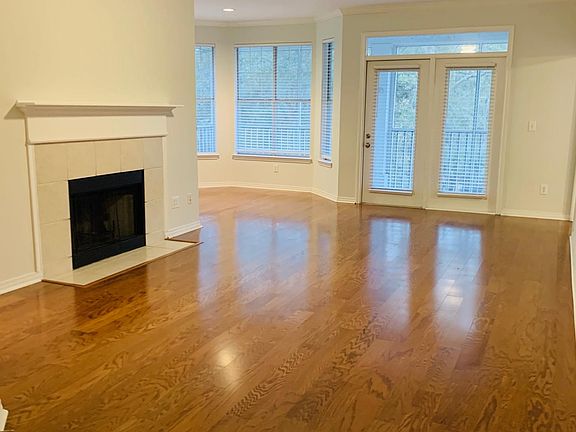 Open Floor plan with lots of light and hardwood flooring in living areas.