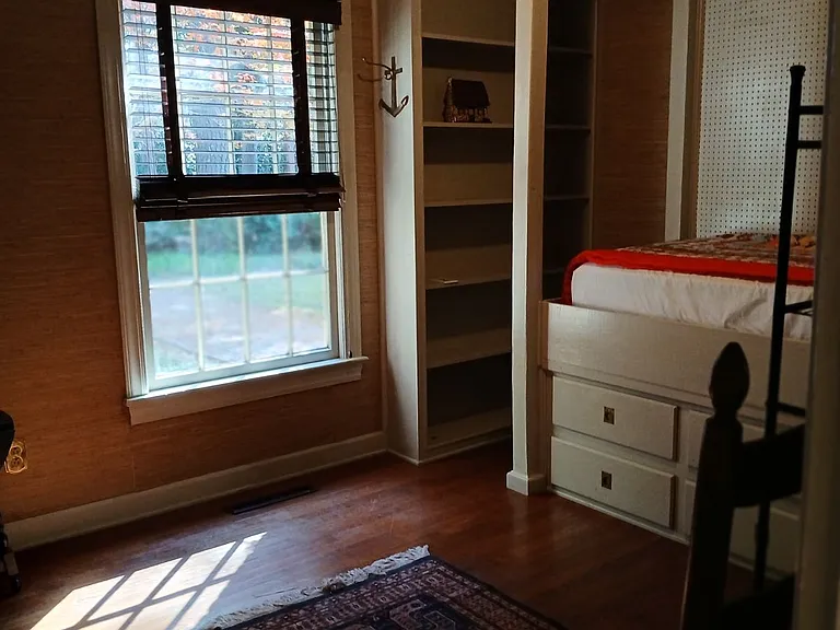 One of the three bedrooms includes a child's bedroom with built in ship's bunk.