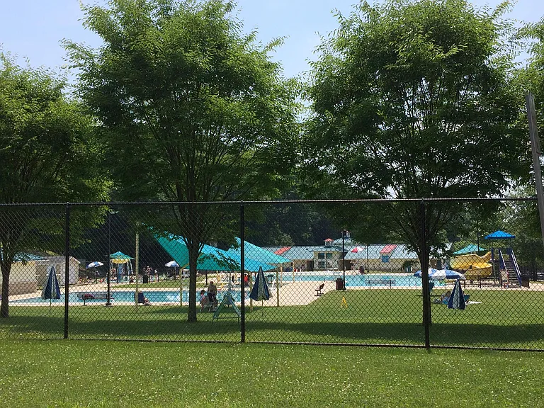 A short walk to the pool, playground, tennis courts, library and walking path.