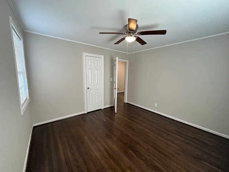 Front bedroom looking toward Hallway. Door and closet in view.