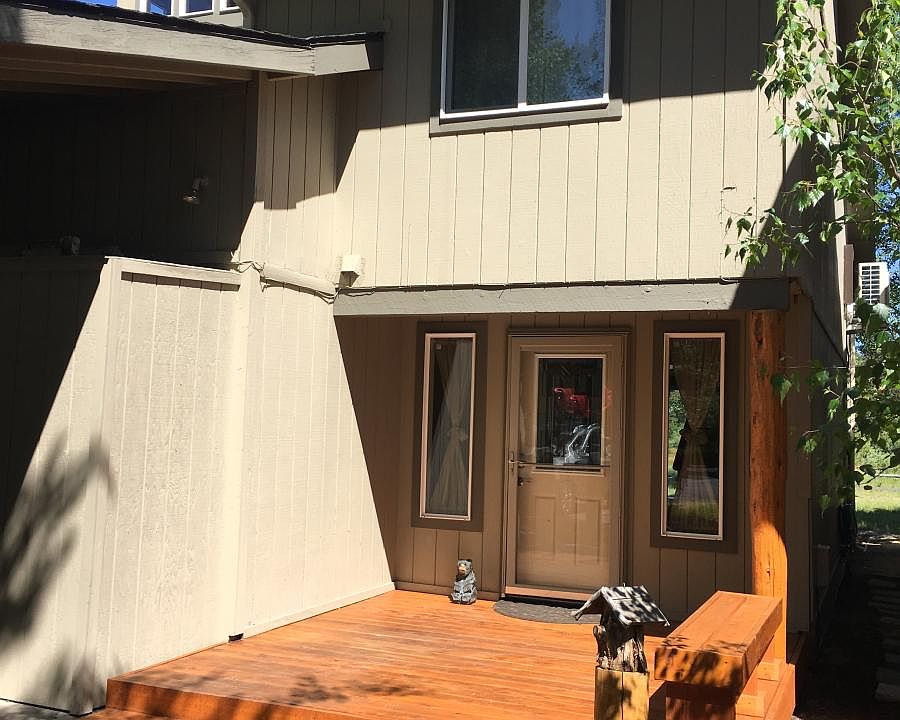 Front of house with sunny sitting area