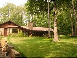 View from woods to back of house