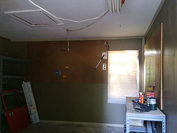 Room (door by car port)