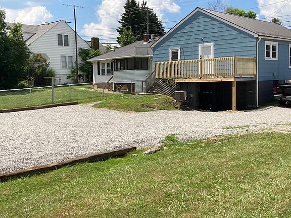 Rear view of the deck and the parking area.