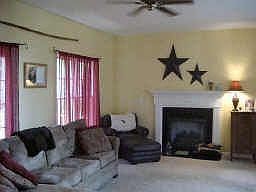 Spacious living room features new carpet and gas fireplace!