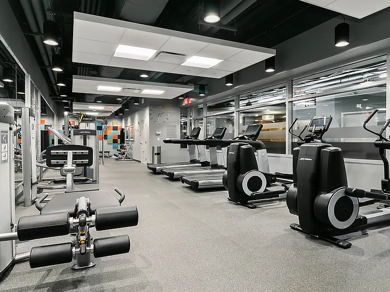 Fitness center features Fitness on Demand virtual fitness classes, cardio machines with personal TVs and resistance machines