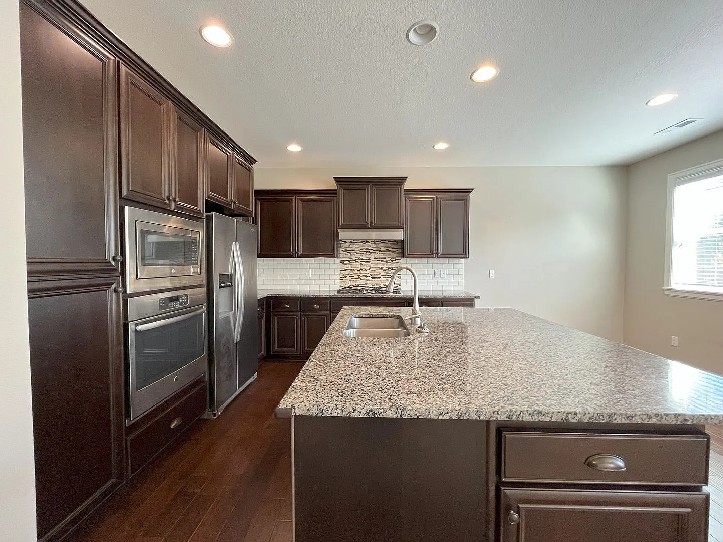 Spacious 4-Bedroom + Bonus Room with Modern Kitchen, Solar Panels & Private Fenced Backyard! — Photo 4