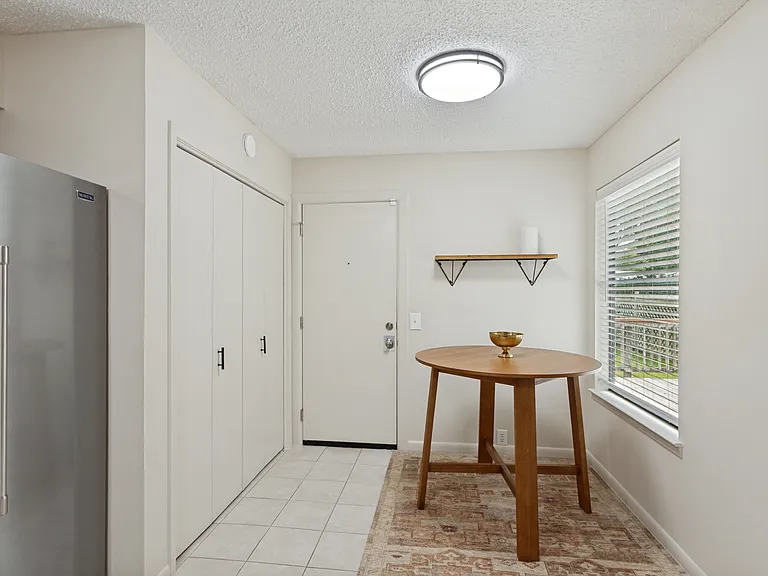 Eat in kitchen area, door to back yard and laundry closet