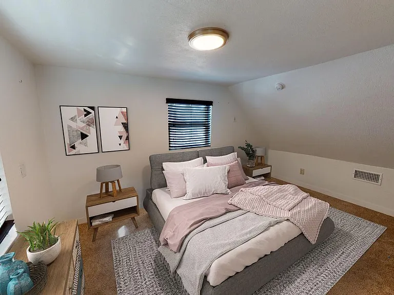 Bedroom 1. This image shows a virtually furnished space. Bedrooms come unfurnished.
