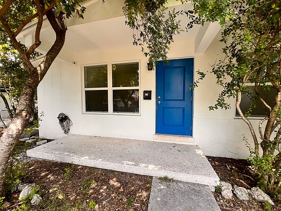 Front porch. House features all hurricane-impact-resistant windows