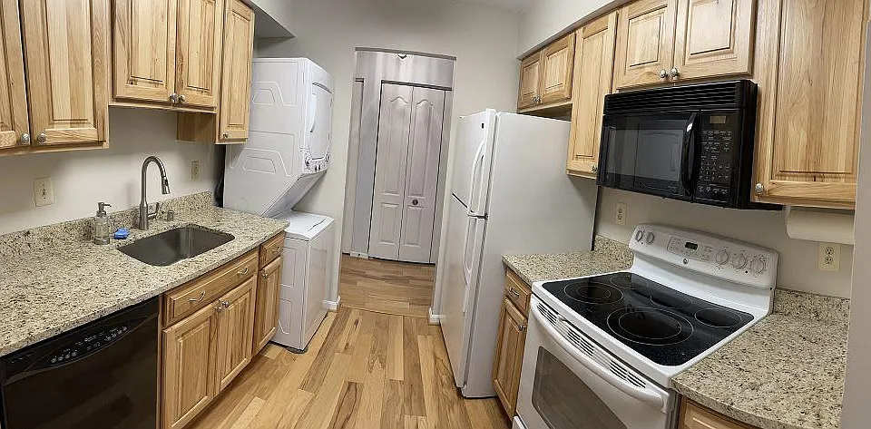 Fully updated kitchen with granite counters and new hardwood flooring